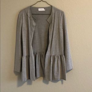 Grey cardigan with flouncy hem